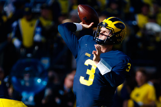 Michigan Quarterback Wilton Speight Throws the ball. Sports Q&A